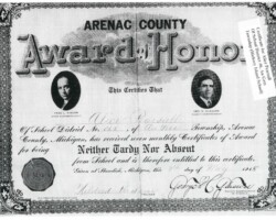 7 May 1915. Monthly attendance award. Signed by Mildred Badour (teacher), George C Glasure (Co School Comm). 1915 Hickory Island School Student Attendance Award