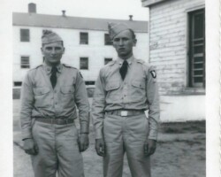Who are these men? Where was the photo taken? When? What do the uniforms tell us about these two individuals? Two men in uniform