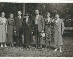 Who are these people? Where? When? Special event? Five women and three men
