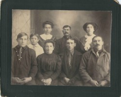 Who are these people? Is this a family portrait? Where was it taken? When? Possible family portrait
