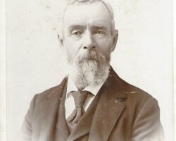 G. F. Sterling of W Bay City, MI "enamel finish" photo. Who is the man? When? Studio photo of a man